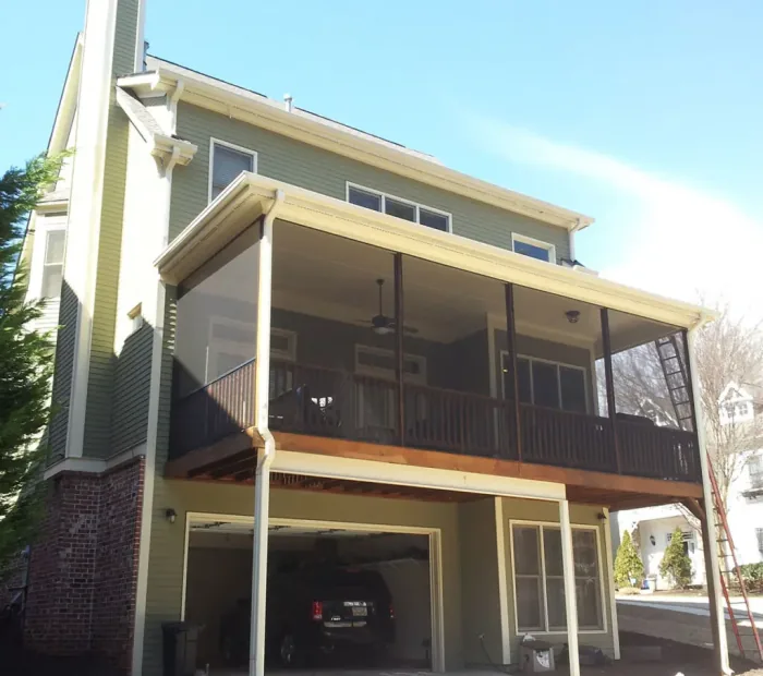Enclosed sunroom with screen and glazing, built by Screen America
