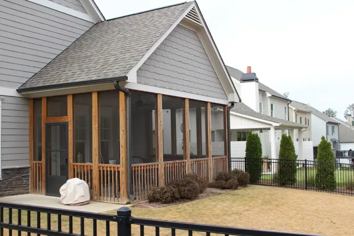 Custom screen porch with wood framing and a natural finish, built by Screen America in North Georgia