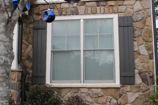 Standard grey mesh on double hung window — screen door, mesh and frame options from Screen America